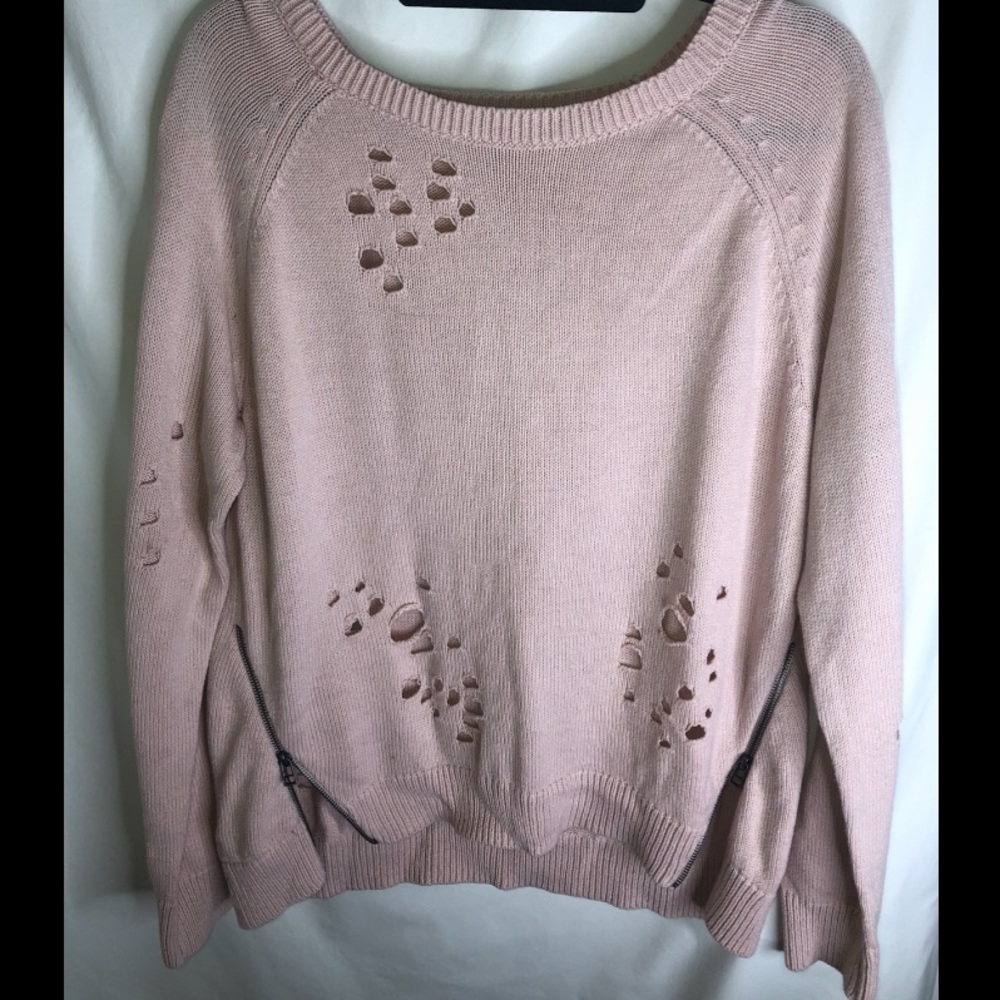 crew neck, with holes, & zippers on the sides